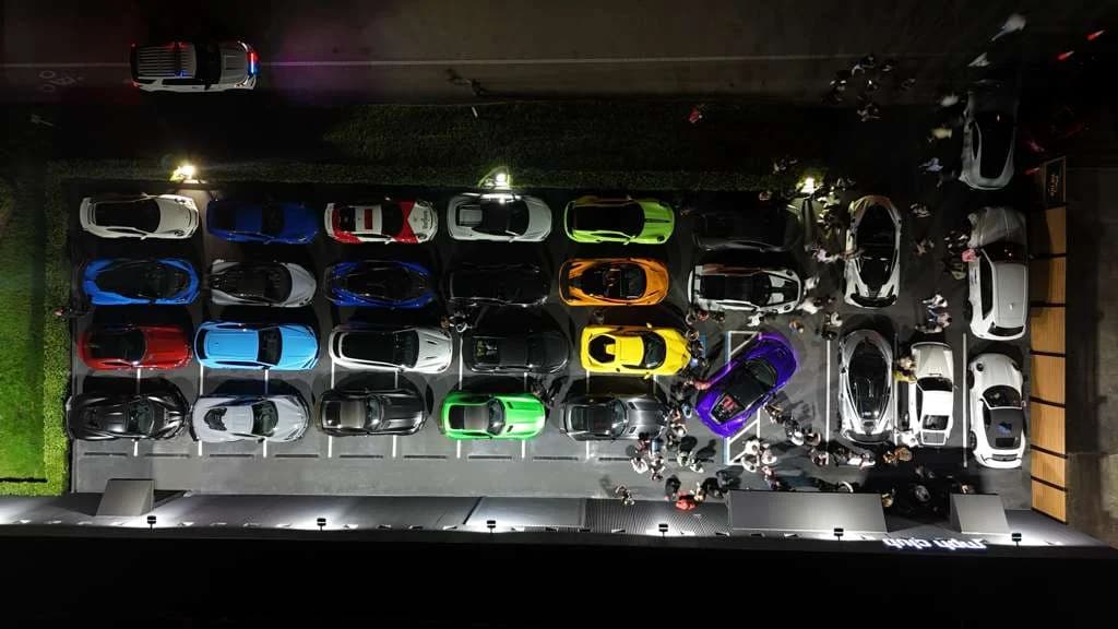 The club's cars lined up at night outside MPH Club